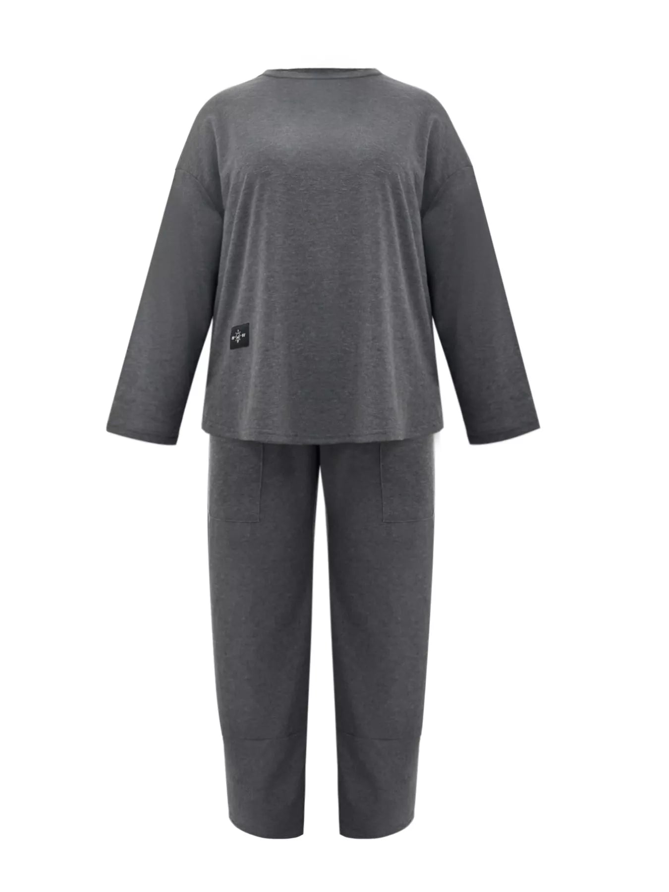 Gray pajama set with a small black logo on a white background