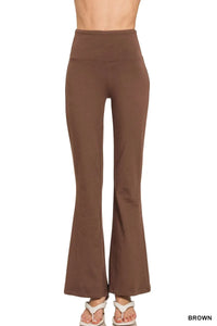 Brown flared pants on a white background
