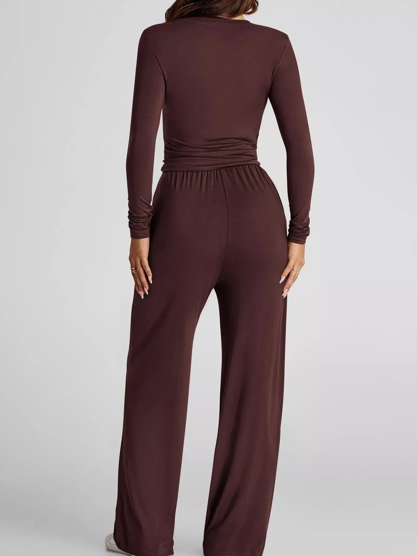 Brown jumpsuit on a white background