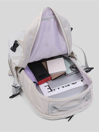 Backpack with items inside on a light gray background