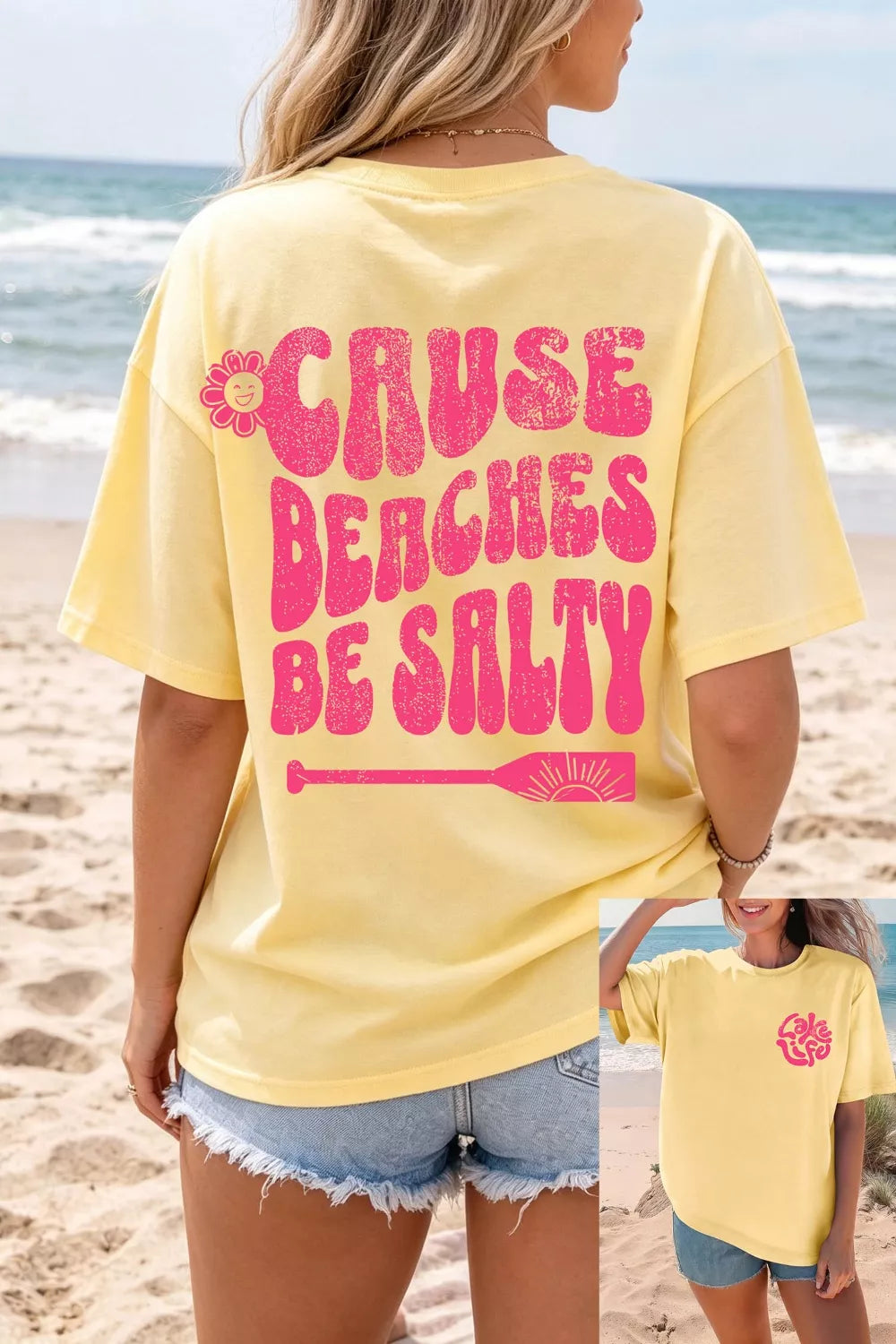 Person wearing a yellow t-shirt with pink text on a beach
