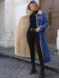 Woman wearing a blue denim coat with beige fleece lining, black outfit, and black boots on a city street.