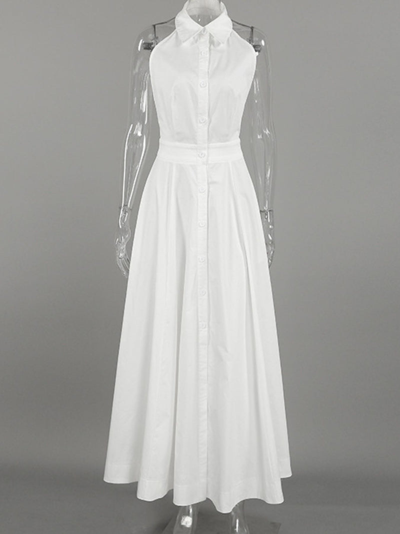 White dress on a mannequin against a gray background