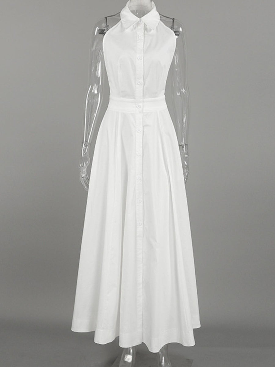 White dress on a mannequin against a gray background