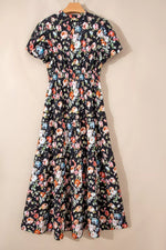 Floral dress on a hanger against a beige background