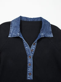 Black shirt with a denim collar and buttons on a white background