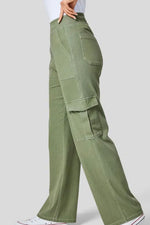 Green cargo pants on a white background