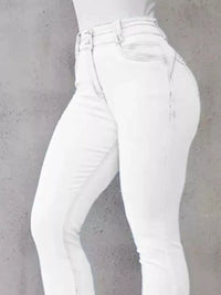 White jeans on a gray background