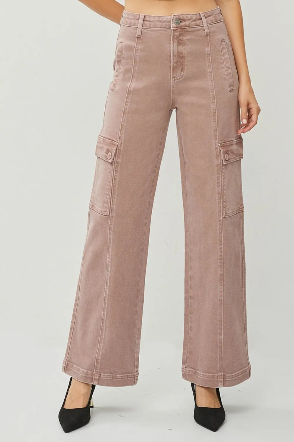 Pink wide-leg pants worn by a person on a white background