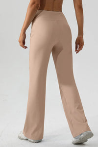 Beige pants worn by a person on a light gray background