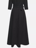 Black dress with a belt on a white background