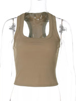 Beige tank top on a mannequin with a white background
