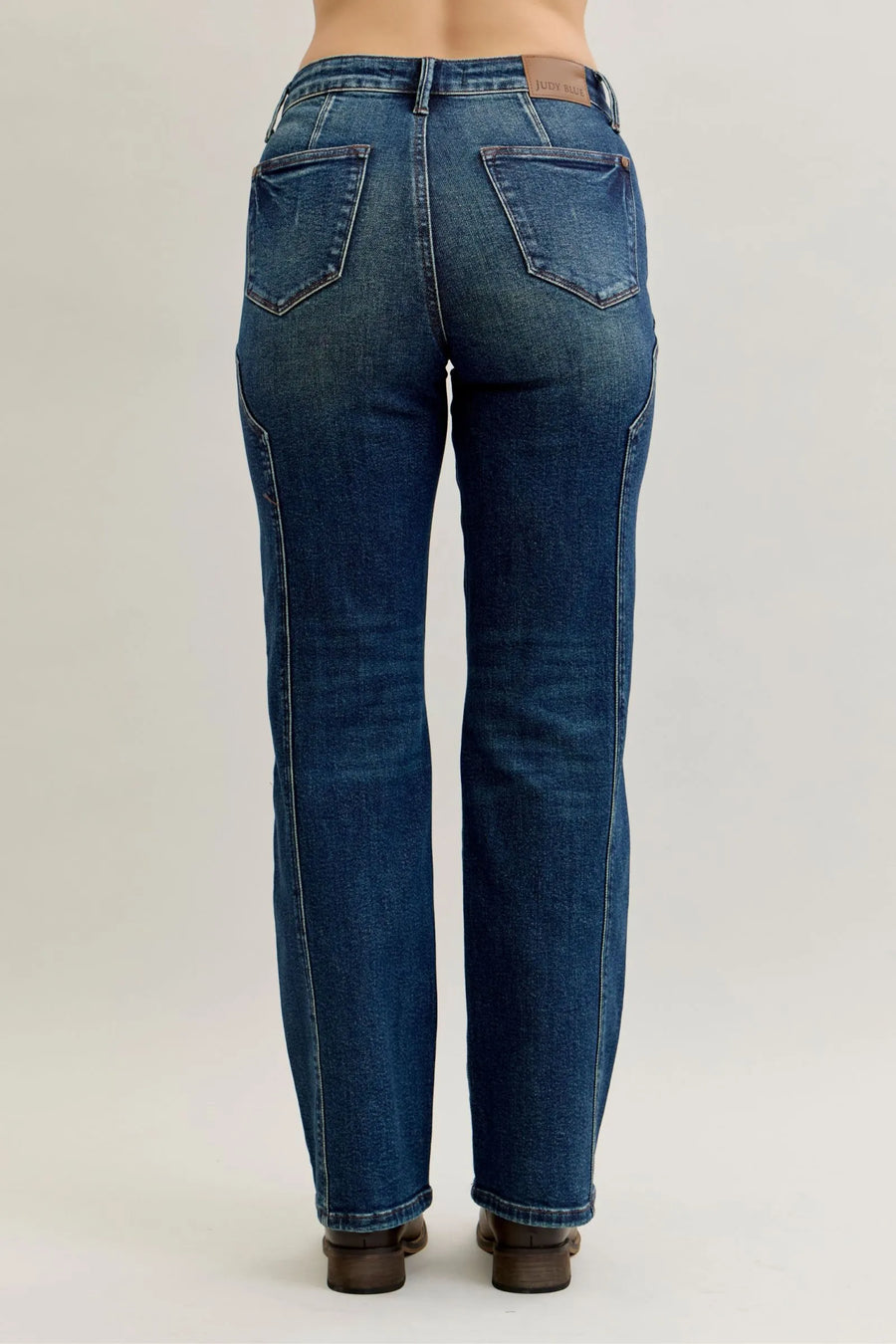 Blue jeans on a plain background