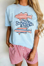 Light blue t-shirt with fish graphic and red checkered shorts on a plain background