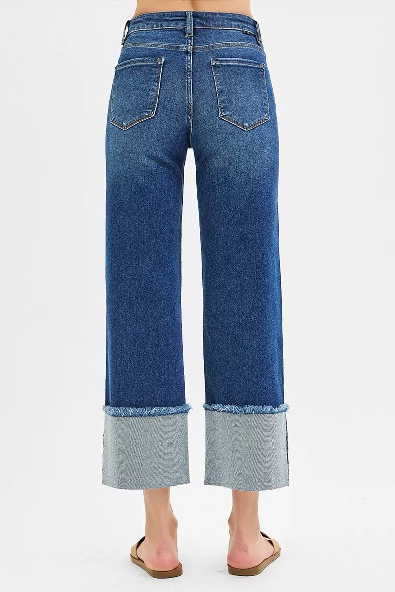 Blue jeans with a white background