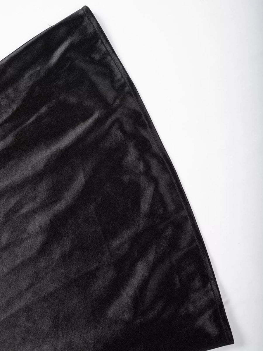 Black fabric with a subtle pattern on a white background