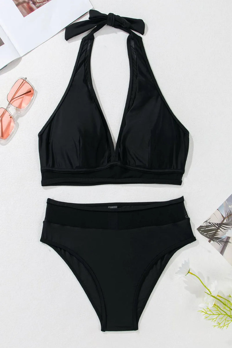 Black bikini set with a halter top and high-waisted bottoms on a light background.