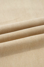 Close-up of beige fabric with folds