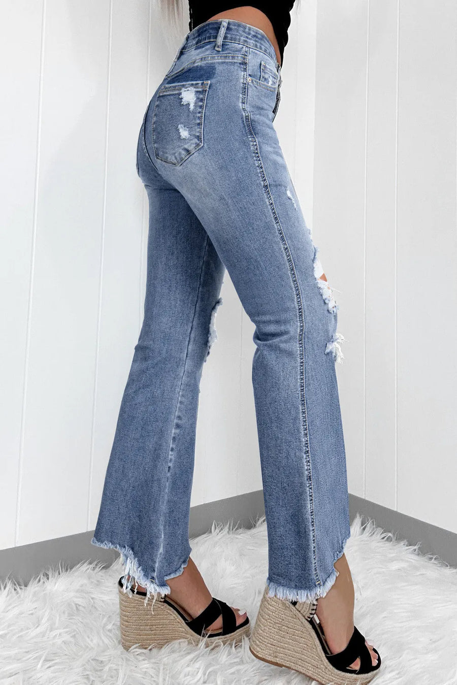 Side view of Distressed Raw Hem Bootcut Jeans