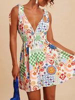 Colorful patterned dress worn by a person on a beige background