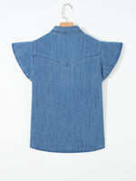 Blue denim shirt on a hanger against a white background