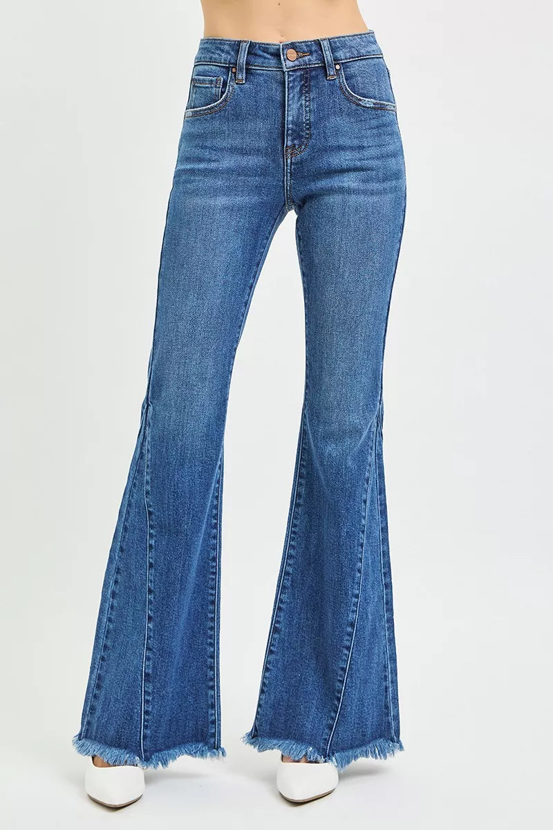 Blue flared jeans on a white background