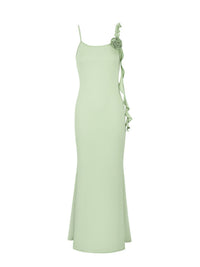 Light green dress with floral details on a white background