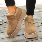 Woman showing the side of a brown Round Toe Platform Boots 