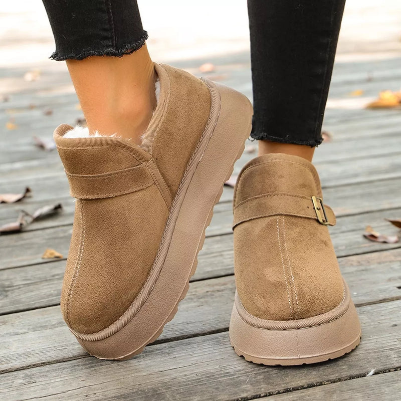 Woman showing the side of a brown Round Toe Platform Boots 