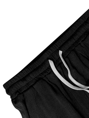 Black pants with a drawstring on a white background