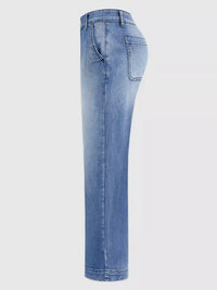 Light blue denim jeans on a white background