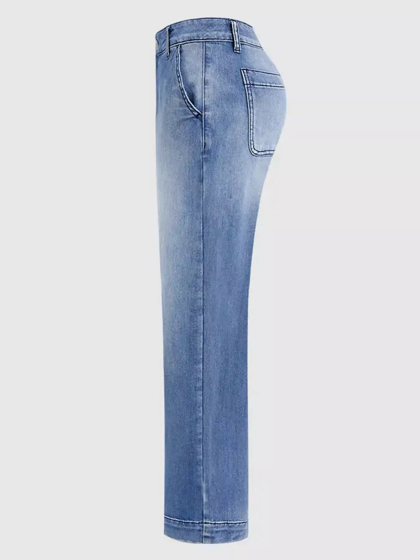 Light blue denim jeans on a white background