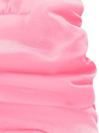 Close-up of pink fabric with a textured pattern