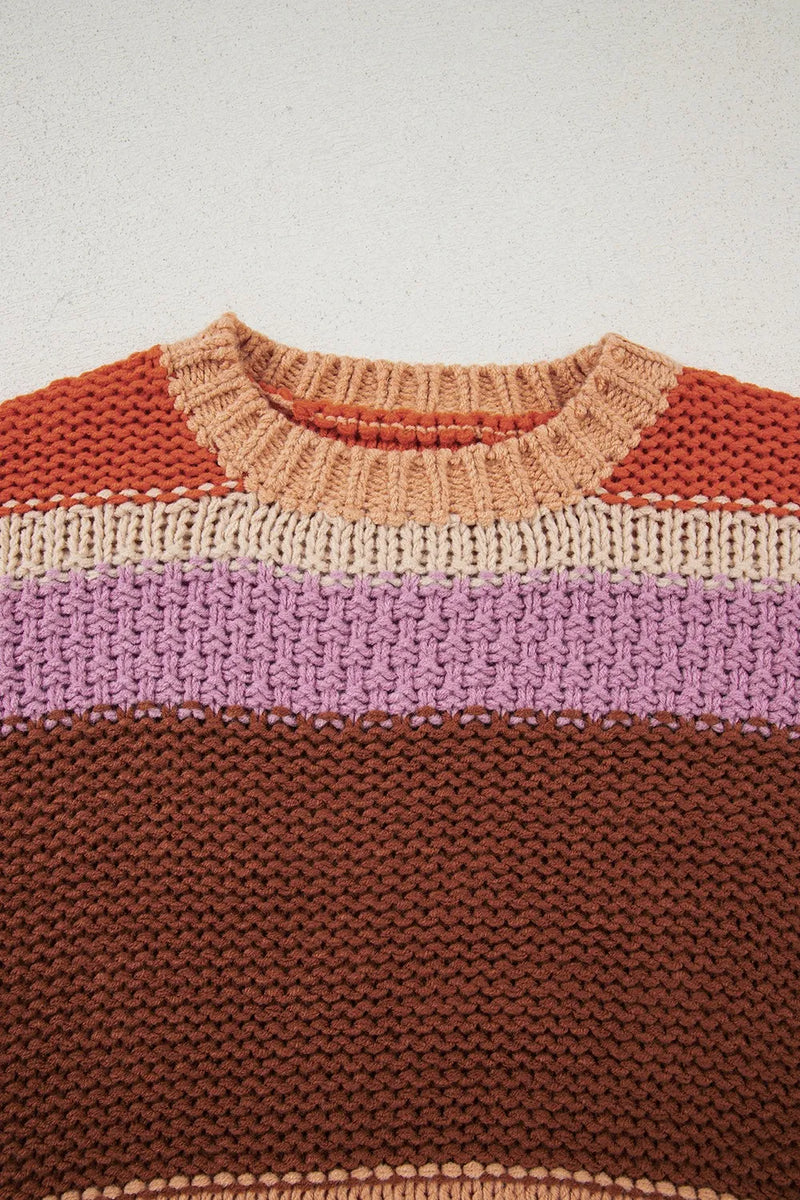 Knitted sweater with color-blocked design on a light background