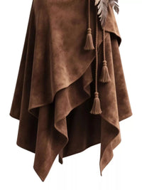 Brown suede blanket with tassels on a white background
