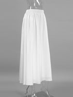 White skirt on a mannequin against a gray background