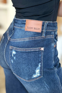 Blue jeans with a Judy Blue label on the back pocket.