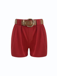 Red shorts with a brown belt on a white background