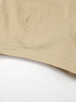 Close-up of beige fabric on a white background