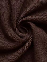 Close-up of brown fabric with folds