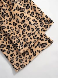 Leopard print fabric on a light gray background