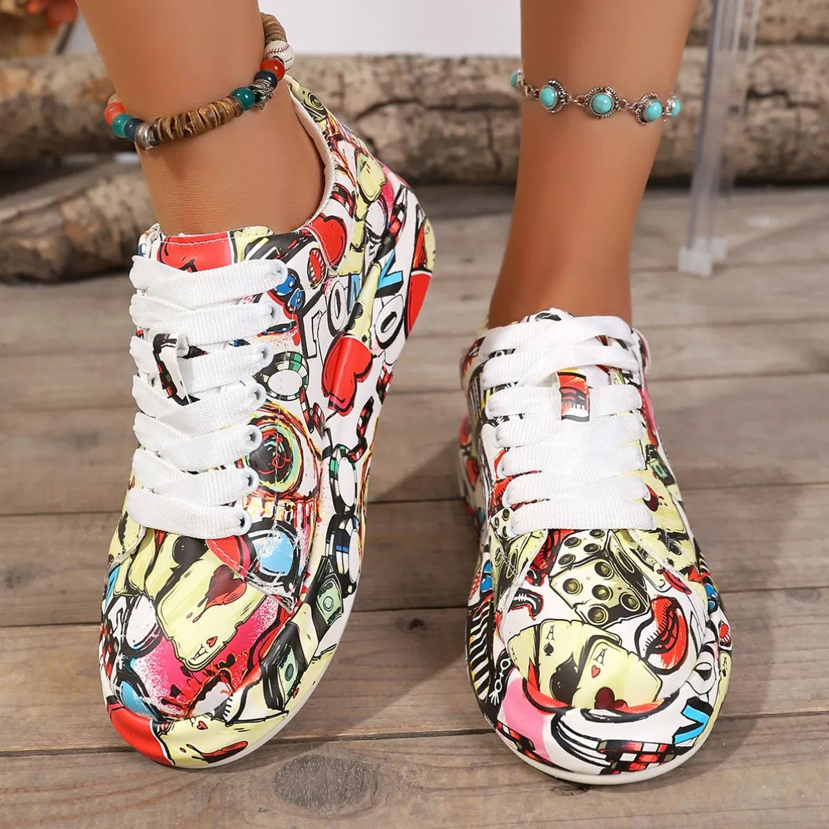 Colorful sneakers with a pattern on a wooden floor
