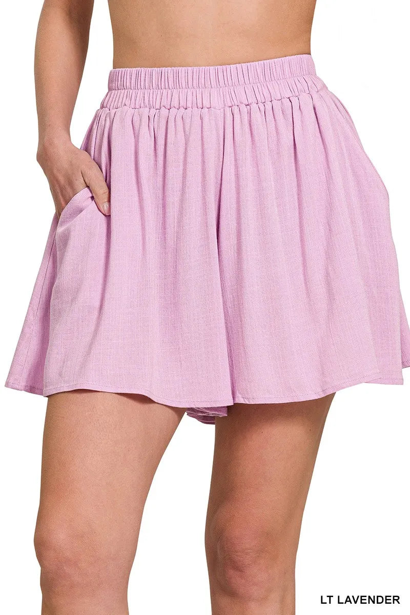 Light lavender skirt worn by a person on a white background