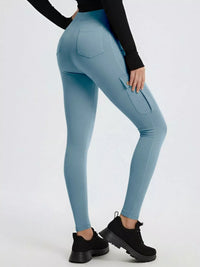 Light blue leggings worn by a person on a white background