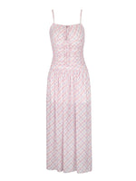 Pink patterned dress on a white background