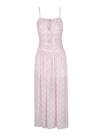 Pink patterned dress on a white background
