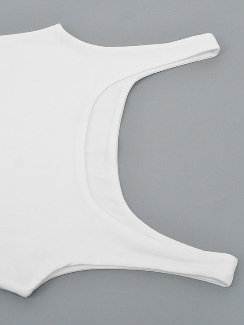 White bikini top on a gray background