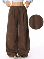 Brown corduroy pants with a close-up of the fabric texture on a white background.
