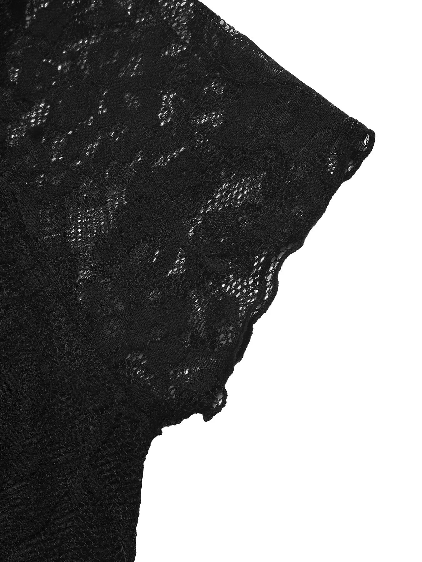 Close-up of black lace fabric on a white background