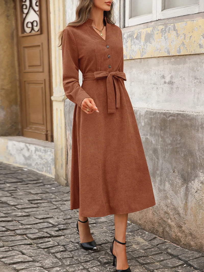 Woman walking down the street in Max-Origin dres